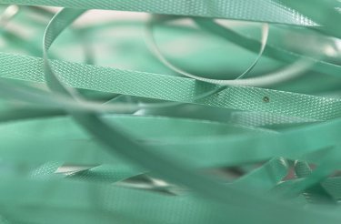 close up of green plastic strapping