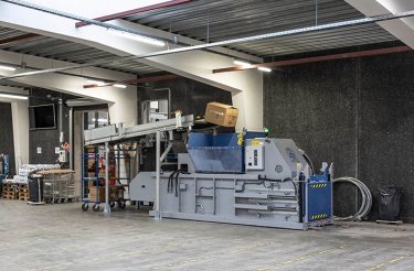 Rented big baler in action in production