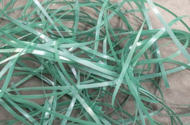close up of green plastic strapping