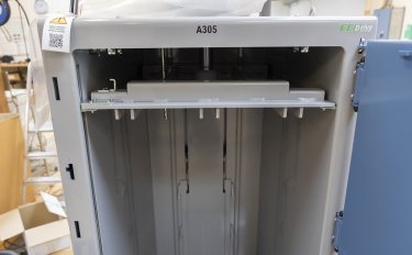 look inside a grey baler that needs to be serviced