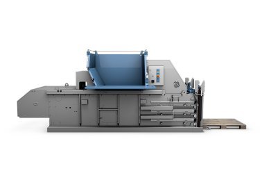 large grey recycling baler on white background