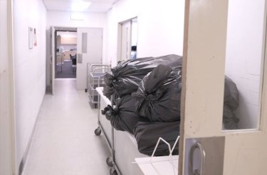 bags-of-waste-in-hospital-aisle