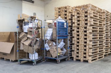 cardboard in cages for disposal
